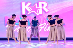 The Dark Dresses Lightly